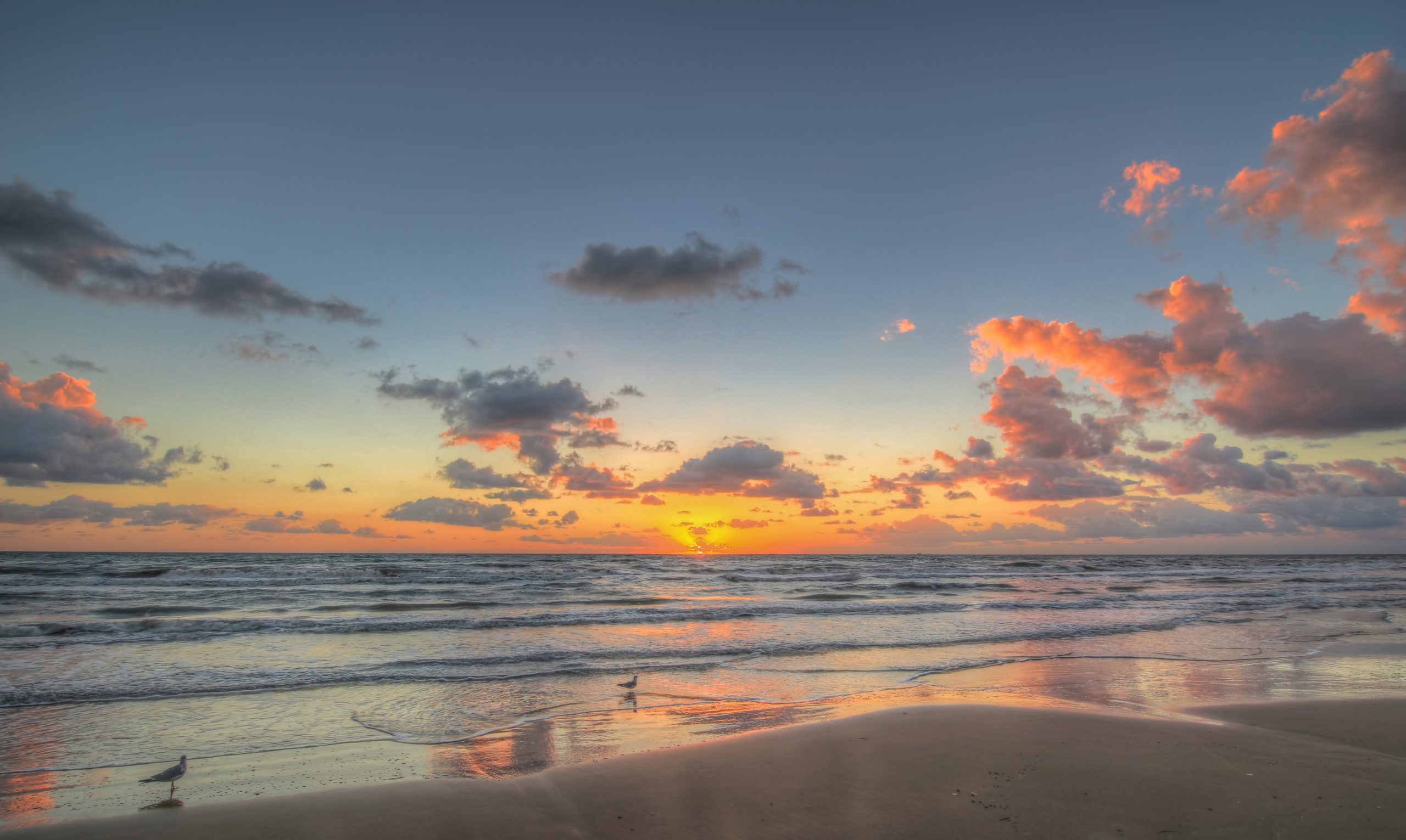 Sunrise over the beach in South Padre Island Texas, one of the best Texas romantic getaways