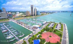 Corpus Christi from above with the harbor in the foreground and the skyline in the background