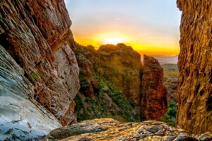 sunset over a rocky section of texas hiking trail in big bend nap, home to some of the best hiking in texas