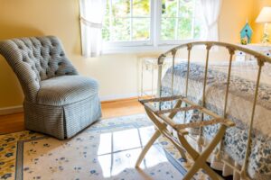 light and airy bedroom with hardwood floors. there are plenty of beautiful bed and breakfasts in jefferson texas