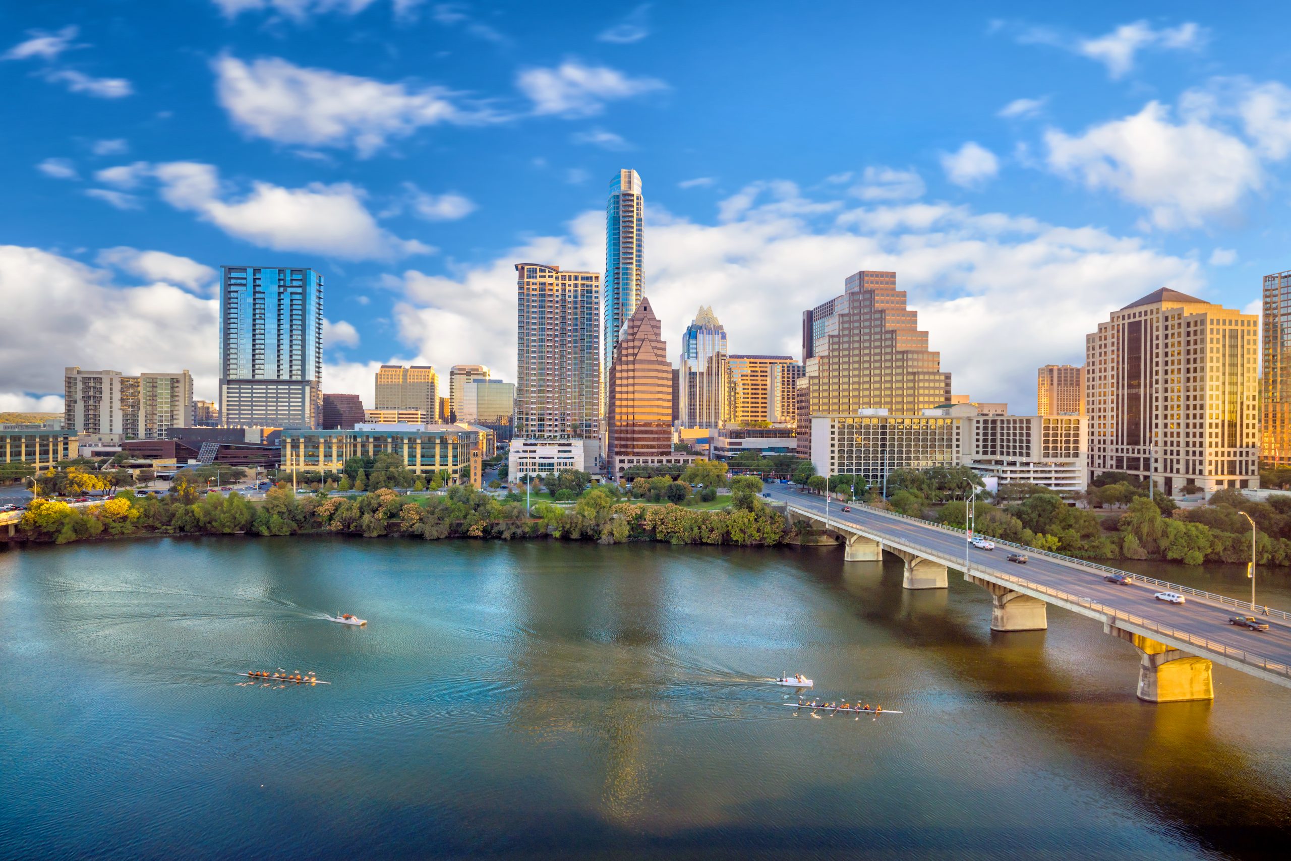view of austin skyline across lady bird lake, an essential view during a long weekend in austin tx itinerary