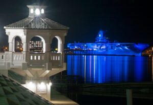 blue ghost of uss lexington lit up at night in corpus christi, one of the most haunted places in texas