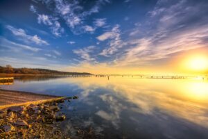sunrise over a lake, one of the best things to do in north texas