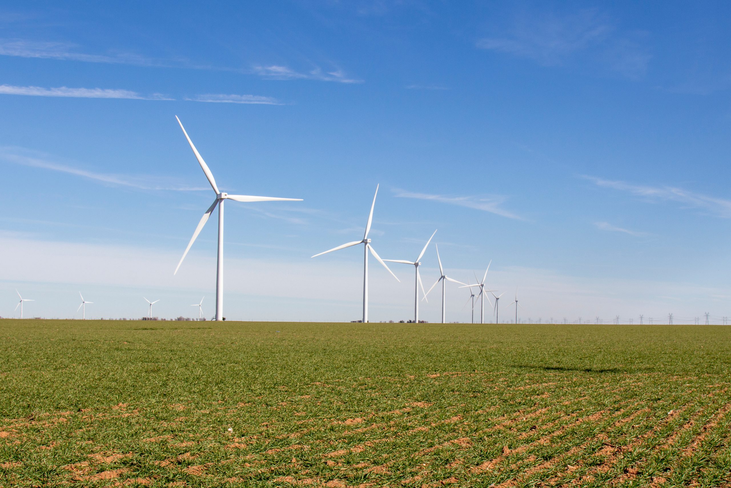 modern windmills as seen along the road when visiting the best things to do in texas panhandle plains
